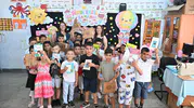 Başkan Tugay’dan Kiraz ve Aliağalı çocuklara karne hediyesi