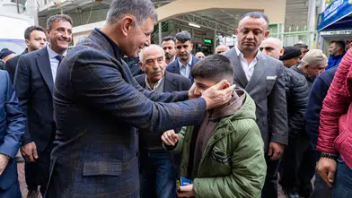 Başkan Tugay bayram namazında Bucalılarla buluştu